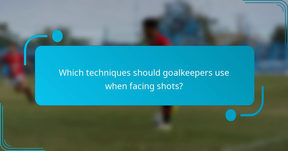 Which techniques should goalkeepers use when facing shots?